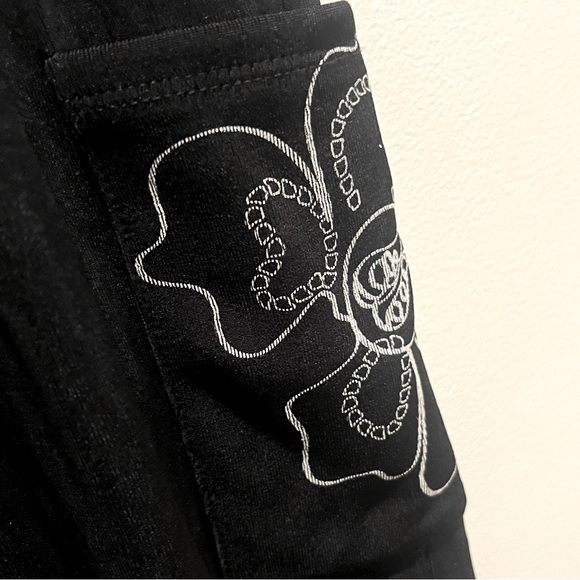 2/$35 Chico’s Travelers Slinky Black Wide-Leg Pants White Floral Detail 2 L 12 - Picture 3 of 5